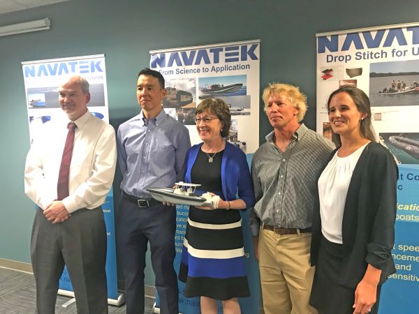 Maine Senator Susan Collins with representatives from Navatek and Front Street Shipyard