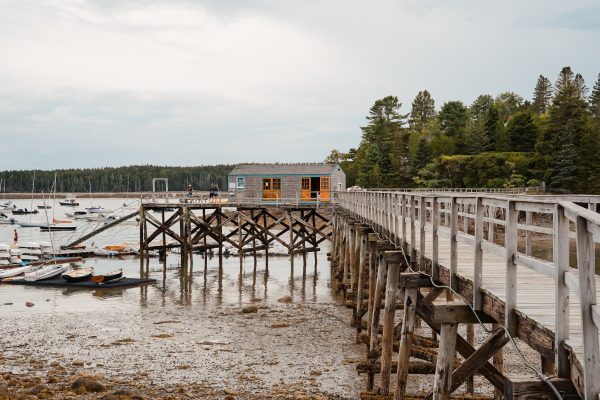 Wharf with dock house at low tide